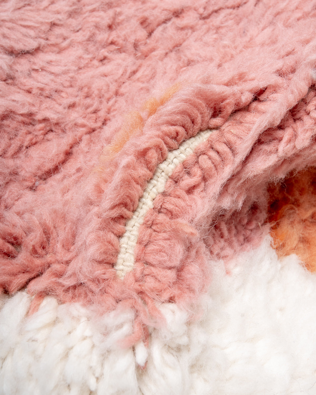 Modern, designer, handcrafted Berber rug from Morocco. Beniourain carpet with beautiful colours and patterns and fluffy wool texture.